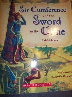Book cover for Sir Cumference and the Sword in the Cone (A Math Adventure) by Neuschwander, Cindy