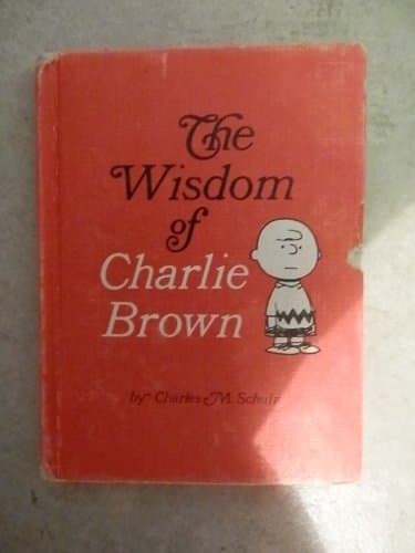Book cover for The Wisdom of Charlie Brown by Charles M. Shulz
