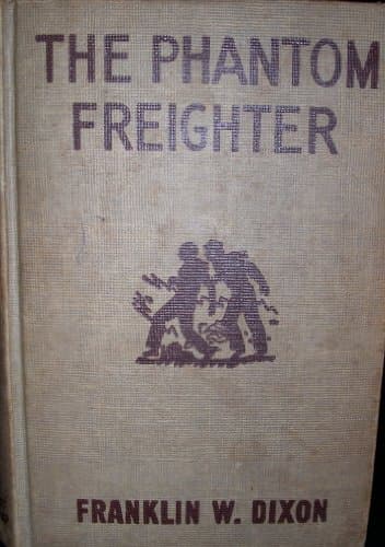 Book cover for The Phantom Freighter (The Hardy Boys Mystery Stories # 26) by Grosset & Dunlap
